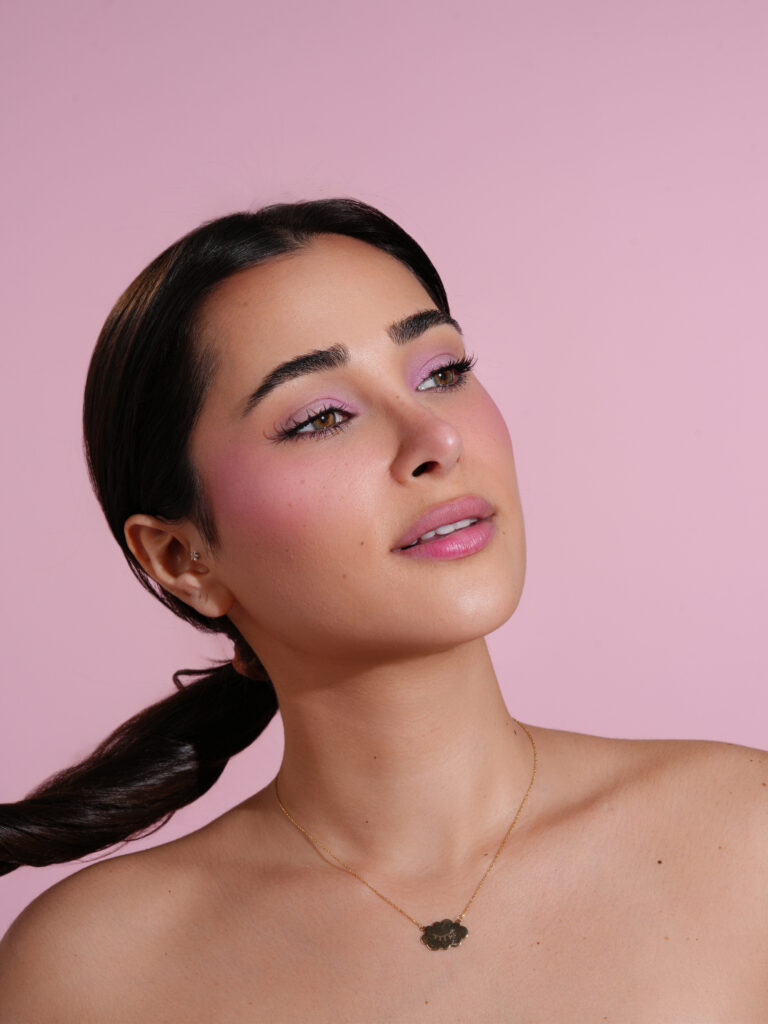 Model with soft pink Heaven Beauty blush and tint